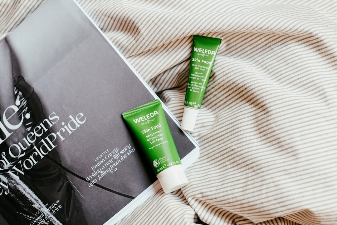 a-couple-of-tubes-of-toothpaste-sitting-on-top-of-a-bed-xmwonwrqvvs